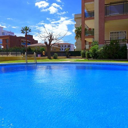 Rentalmar Amanecer Miami Playa Bagian luar foto